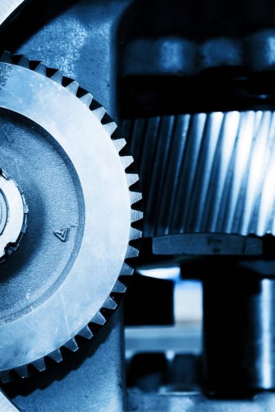 A close-up of gear in a machine used for factory automation maintenance and Industrial Repair Services.